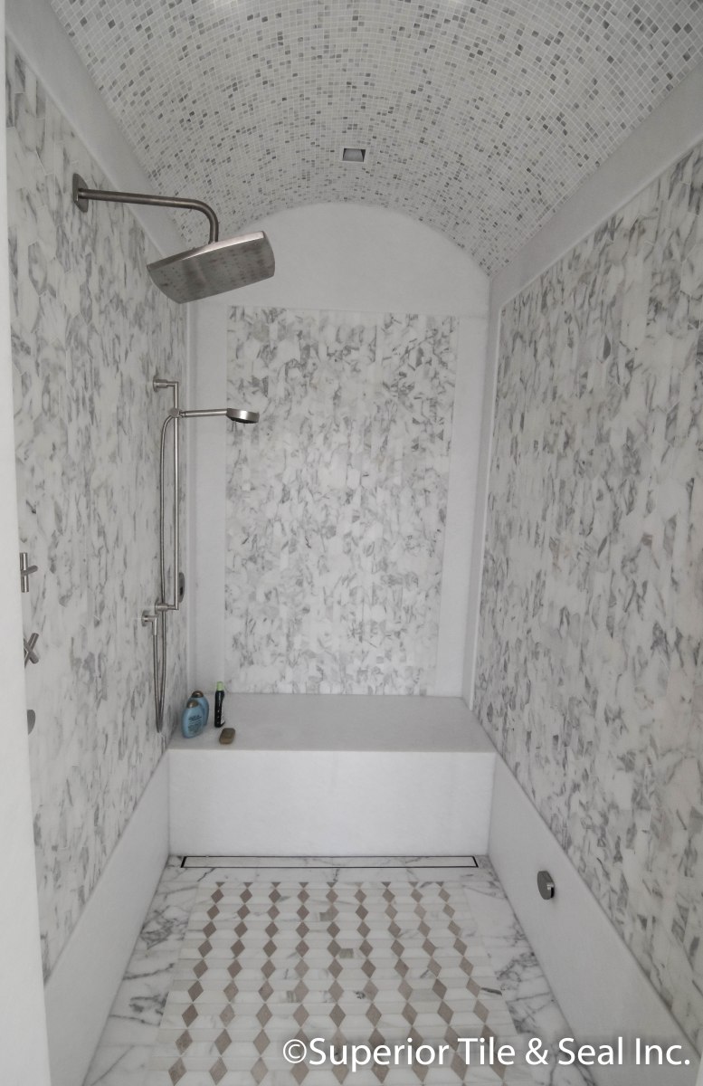 Calcutta marble shower tile in Los Angeles