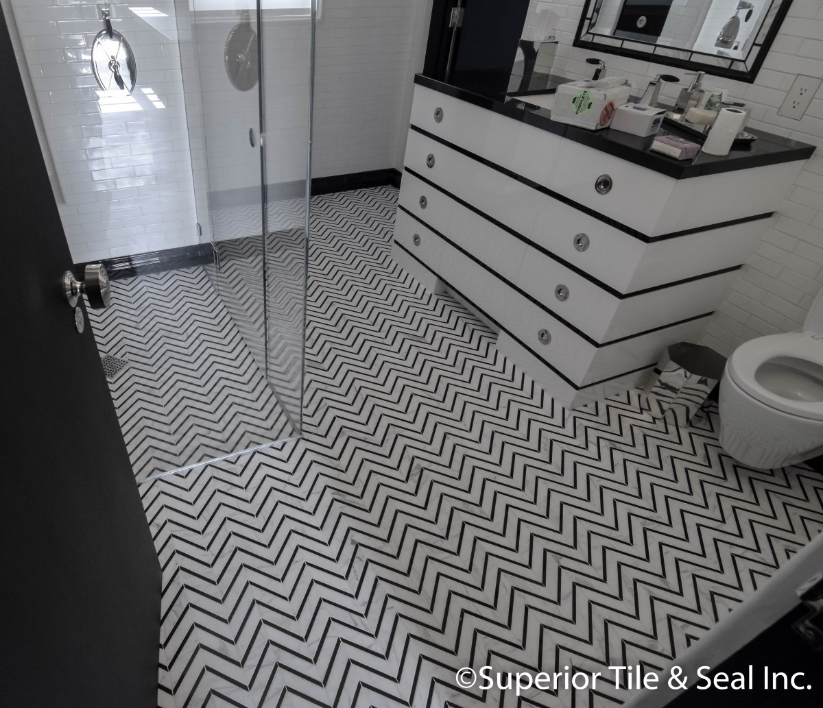 Photo fo bathroom, living room and entry floor tile in los angeles